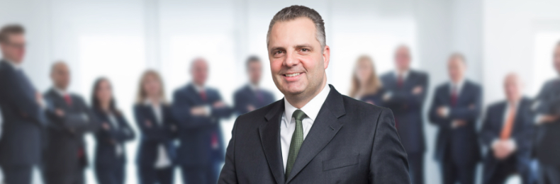 Teambild mit Arnd Allert